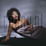 04-03-1985 Whitney Houston at studio in Amterdam, The Netherlands. March 04, 1985.

[keywords]Posed, Eye Contact, Dress[/keywords]